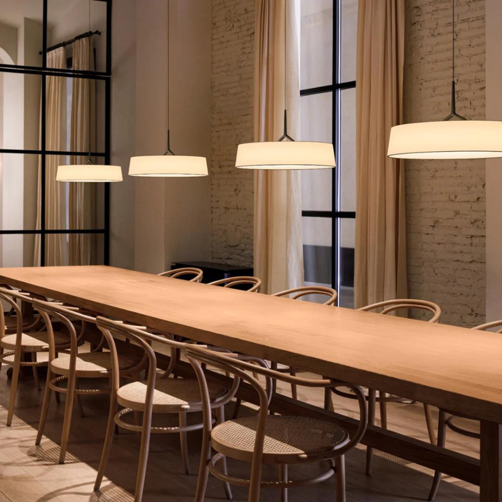 Minimalist fabric and metal pendant light showing suspended form