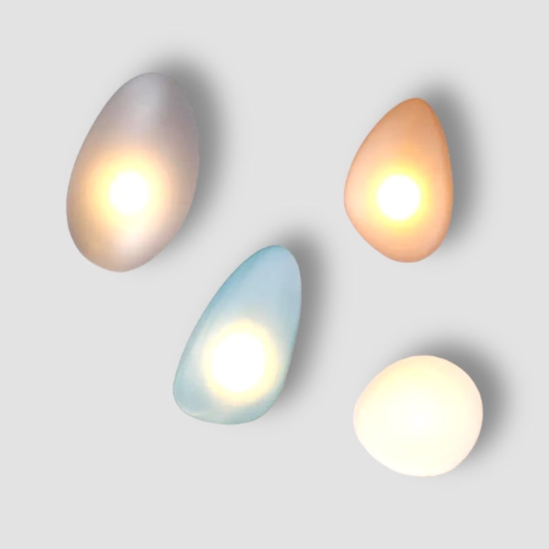 Nordic stained glass wall light in amber with pebble-shaped glass shade