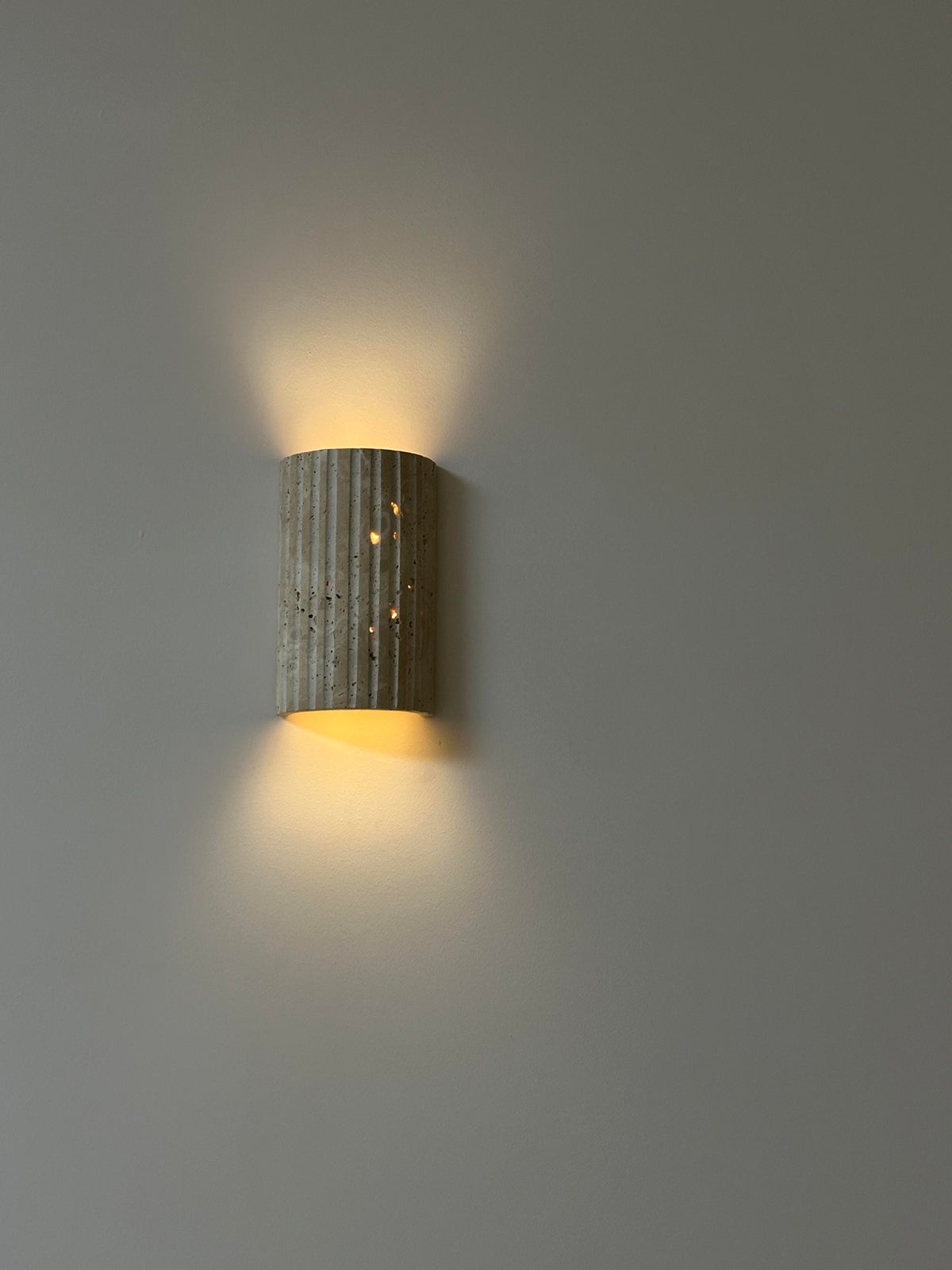 Rectangular travertine exterior wall light with integrated LED