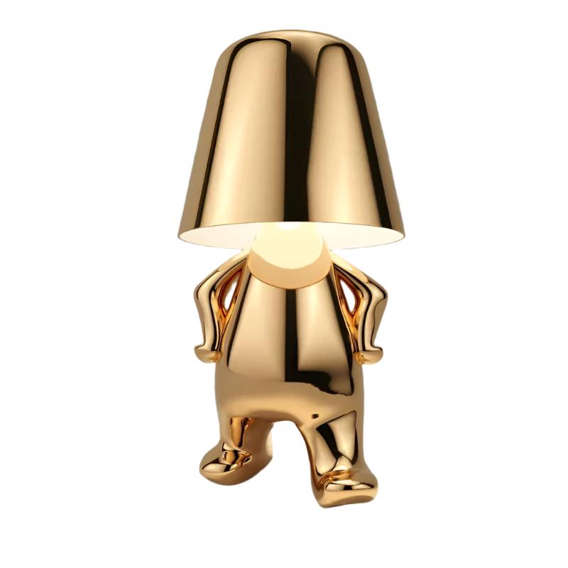 Modern sculptural rechargeable LED table lamp in gold, Walking pose